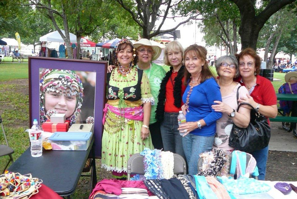 Community members at cultural festival booth